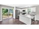 Contemporary kitchen with white cabinetry, granite counters, and stainless steel appliances at 506 Locust St, Rock Hill, SC 29730