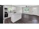 Open kitchen featuring white cabinets, stainless steel appliances, and a center island at 506 Locust St, Rock Hill, SC 29730