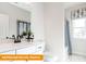 Bathroom featuring white cabinets, countertop and fixtures with a shower and tub at 530 Hullview Vis, Monroe, NC 28110