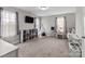 Bright, neutral bedroom with a teepee, built in storage, and large windows at 5668 Stanfield Ridge Dr, Stanfield, NC 28163