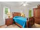 Inviting bedroom with a well-lit space, a comfortable bed and matching nightstands at 626 Trail Ridge Rd, Matthews, NC 28105