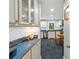 Modern kitchen area featuring sleek countertops, subway tile backsplash, and stainless steel appliances at 626 Trail Ridge Rd, Matthews, NC 28105