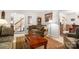 Cozy living room with plush seating, area rug, and staircase access at 626 Trail Ridge Rd, Matthews, NC 28105