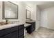Elegant bathroom featuring dual vanities, granite countertops, and modern fixtures, perfect for a luxurious lifestyle at 6510 Nathan Dr # 78, Charlotte, NC 28269