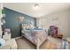 A bedroom features a colorful design, cozy decor, and a vibrant space for creativity and relaxation at 6510 Nathan Dr # 78, Charlotte, NC 28269