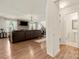 Spacious living room with stone fireplace and hardwood floors, open to the staircase at 6510 Nathan Dr # 78, Charlotte, NC 28269