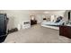 Spacious main bedroom with fitness equipment and ample closet space, offering both comfort and functionality at 6510 Nathan Dr # 78, Charlotte, NC 28269