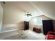 Attic room with vaulted ceiling and ceiling fan at 8620 Rolling Fields Rd, Charlotte, NC 28227