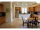Bright eat-in kitchen features stainless steel appliances and adjacent dining area with natural lighting at 8620 Rolling Fields Rd, Charlotte, NC 28227