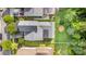An aerial view shows the well-maintained roof and landscaping of the home at 9210 Ginhouse Ln, Charlotte, NC 28277