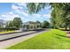 The Bocce ball court is adjacent to common area and landscaping at 9210 Ginhouse Ln, Charlotte, NC 28277