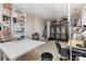 Versatile bonus room with ample storage, desk space, and neutral carpeting at 9210 Ginhouse Ln, Charlotte, NC 28277