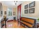 Welcoming foyer featuring hardwood floors and elegant decorative details at 9210 Ginhouse Ln, Charlotte, NC 28277