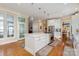 Well-equipped kitchen island with a cooktop, cabinets, and view into living and dining areas at 9210 Ginhouse Ln, Charlotte, NC 28277