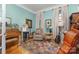 Cozy music room with a piano, guitar, and cello, perfect for musicians and music lovers at 9210 Ginhouse Ln, Charlotte, NC 28277