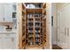 Walk-in pantry with custom wooden shelving provides ample storage space at 9210 Ginhouse Ln, Charlotte, NC 28277