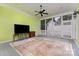 Screened porch with a ceiling fan at 9210 Ginhouse Ln, Charlotte, NC 28277