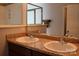 Bathroom featuring double sinks and a large mirror at 10726 Greenhead View Rd, Charlotte, NC 28262