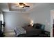 Bedroom with ceiling fan and tray ceiling at 10726 Greenhead View Rd, Charlotte, NC 28262