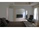 Bedroom with a neutral color scheme and chair at 10726 Greenhead View Rd, Charlotte, NC 28262