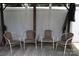 Comfortable, shaded patio area with four seats for entertaining and relaxing at 10726 Greenhead View Rd, Charlotte, NC 28262