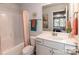 Cozy bathroom with shower-tub combo, white cabinets, and bright vanity lighting at 1090 Gardenia Dr # 5, Mt Ulla, NC 28125