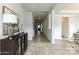 Bright hallway with light-colored wood floors, white trim, and contemporary decor for a welcoming ambiance at 1090 Gardenia Dr # 5, Mt Ulla, NC 28125