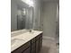This bathroom features double sinks, modern fixtures and stylish gray cabinets at 1130 Gardenia Dr # 7, Mt Ulla, NC 28125