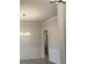 Elegant dining room featuring hardwood floors, chandelier and decorative wall trim at 1130 Gardenia Dr # 7, Mt Ulla, NC 28125