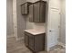 This kitchen features gray cabinets, light countertops and stainless steel appliances at 1130 Gardenia Dr # 7, Mt Ulla, NC 28125