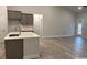 Bright, open-concept living area with vaulted ceiling and cozy fireplace at 1130 Gardenia Dr # 7, Mt Ulla, NC 28125