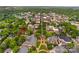 A high-angle aerial view shows the home, with the location indicated by an arrow at 117 N Mulberry St, Statesville, NC 28677