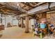 Unfinished basement with brick support columns and exposed ceiling at 117 N Mulberry St, Statesville, NC 28677