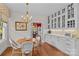 Breakfast nook showcases cabinetry and storage solutions with seating for four at 117 N Mulberry St, Statesville, NC 28677