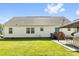 A sprawling backyard with well-maintained lawn and a pergola at 118 Grain Dr, Stony Point, NC 28678