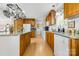 Spacious kitchen boasting an island, granite countertops, hardwood floors, and modern appliances at 118 Grain Dr, Stony Point, NC 28678