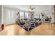 Inviting living room featuring hardwood floors, neutral walls, lots of windows, and an open entry at 118 Grain Dr, Stony Point, NC 28678