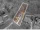 Aerial view shows lot lines and positioning on a tree covered lot at 122 Ardmore Pl, Mooresville, NC 28117