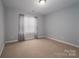 Bedroom with carpet flooring and a window at 122 Ardmore Pl, Mooresville, NC 28117