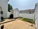 Fenced backyard features a patio, shed, and space for outdoor activities, perfect for relaxation and entertainment at 12564 Jessica Pl, Charlotte, NC 28269
