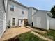 Backyard features fenced yard, patio area, and storage shed at 12564 Jessica Pl, Charlotte, NC 28269