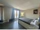 Bedroom featuring a bed with drawers and a window with stylish curtains at 12564 Jessica Pl, Charlotte, NC 28269