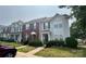 Charming townhome with well-maintained landscaping and inviting walkway, perfect for potential buyers at 12564 Jessica Pl, Charlotte, NC 28269