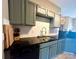 Functional kitchen featuring modern countertops and ample cabinetry space perfect for potential buyers at 12564 Jessica Pl, Charlotte, NC 28269