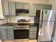 Well-equipped kitchen with stainless steel appliances, functional layout and plenty of storage at 12564 Jessica Pl, Charlotte, NC 28269