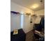 Organized walk-in closet with shelves, hanging racks, and a desk at 12564 Jessica Pl, Charlotte, NC 28269