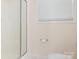 Modern bathroom with glass-door shower and white fixtures at 1271 Applewood Ln, York, SC 29745