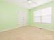 Bedroom featuring neutral carpet, a ceiling fan and double door closet at 1271 Applewood Ln, York, SC 29745