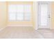 Cozy dining area with tiled floors and a door leading to the backyard, perfect for meals at 1271 Applewood Ln, York, SC 29745