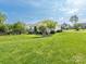 Well-maintained home with a lush lawn and mature landscaping in a quiet neighborhood at 1271 Applewood Ln, York, SC 29745